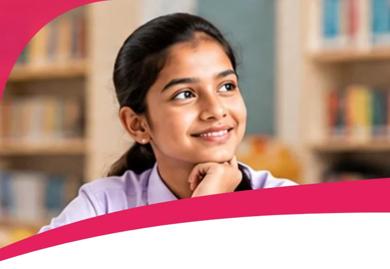 Middle school student thinking in the library at SSP Vidhyashram
